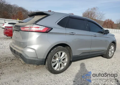 2021 Ford Edge Titanium z USA, uszkodzony, nr VIN 2FMPK4K97MBA27143